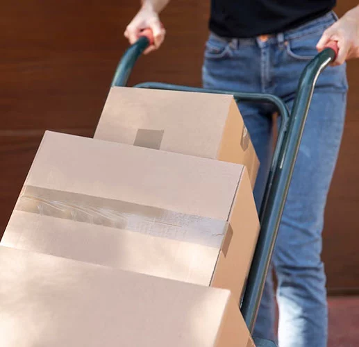 A man is delivered several boxes of printing products to customer.